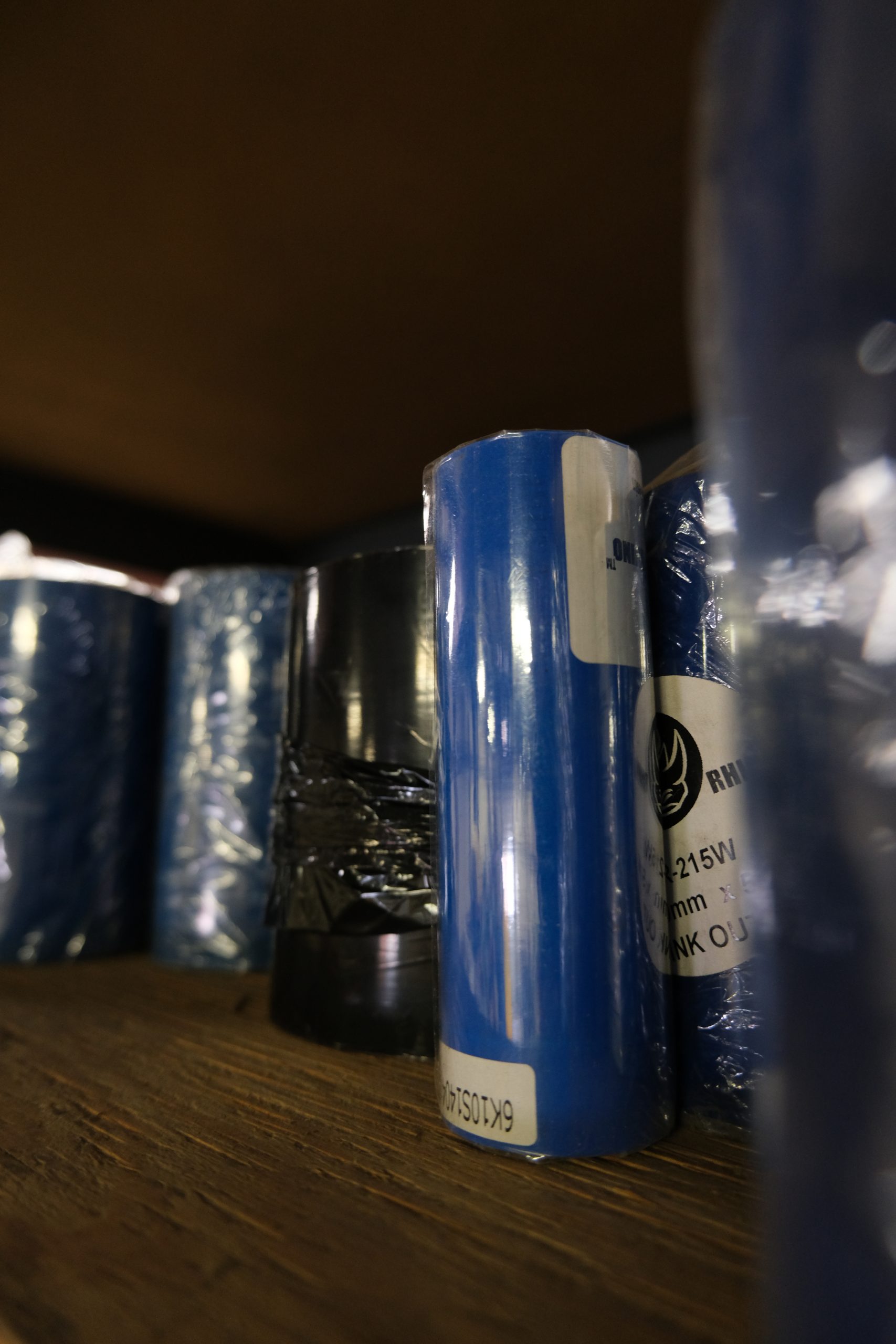 Ribbon rolls on a shelf